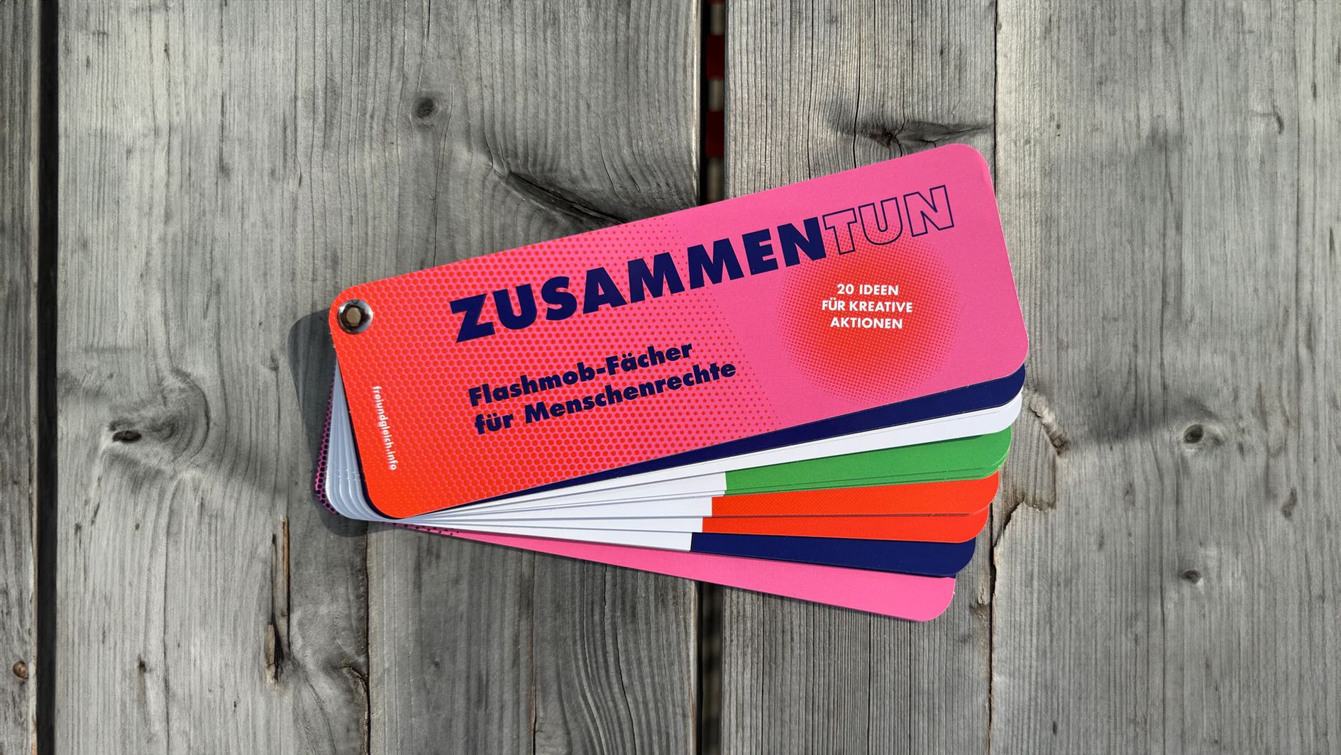 Fächer "ZUSAMMEN.TUN - Flashmob-Fächer für Menschenrechte" Bunter Fächer mit Ideen für Aktionen gegen Menschenrechte
